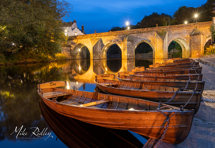 rowing boats on the river wear at Elvet Bridge, Durham City by Mike Ridley